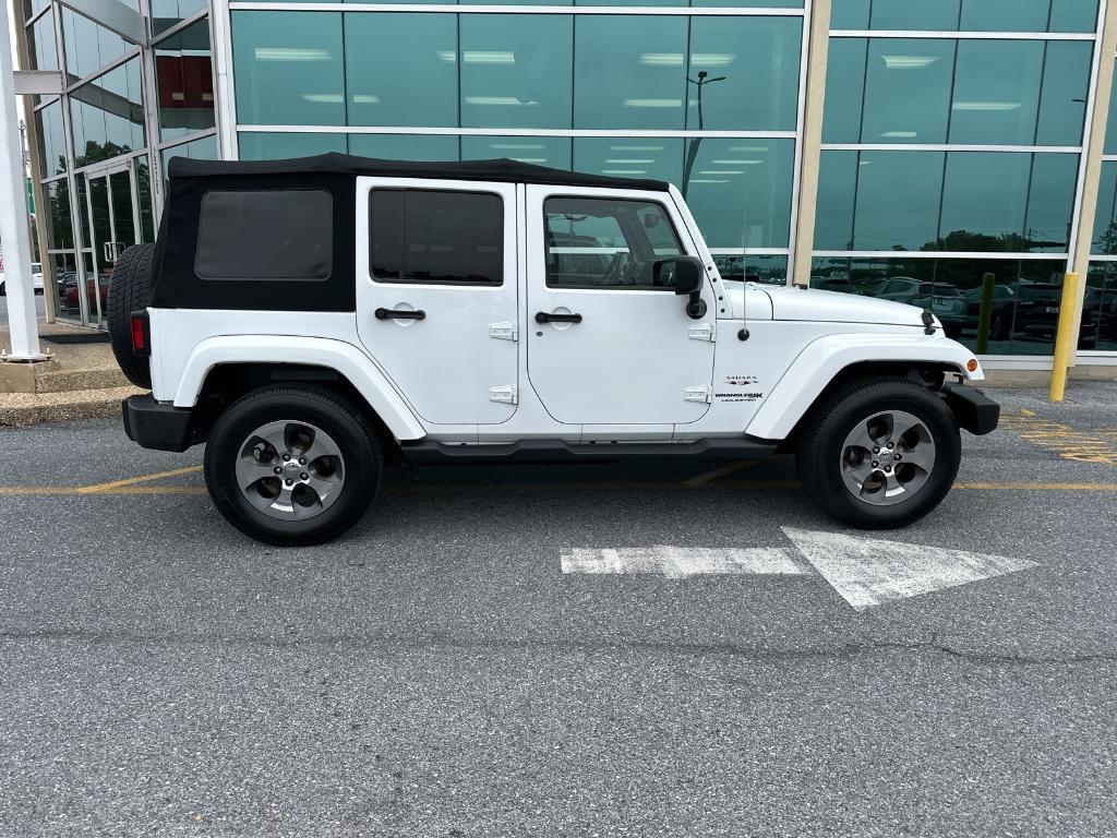 used 2018 Jeep Wrangler JK Unlimited car, priced at $23,779