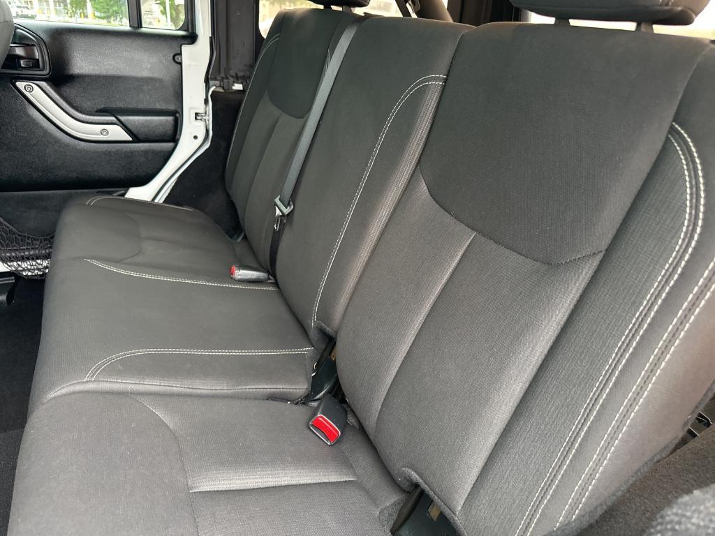 used 2018 Jeep Wrangler JK Unlimited car, priced at $23,779