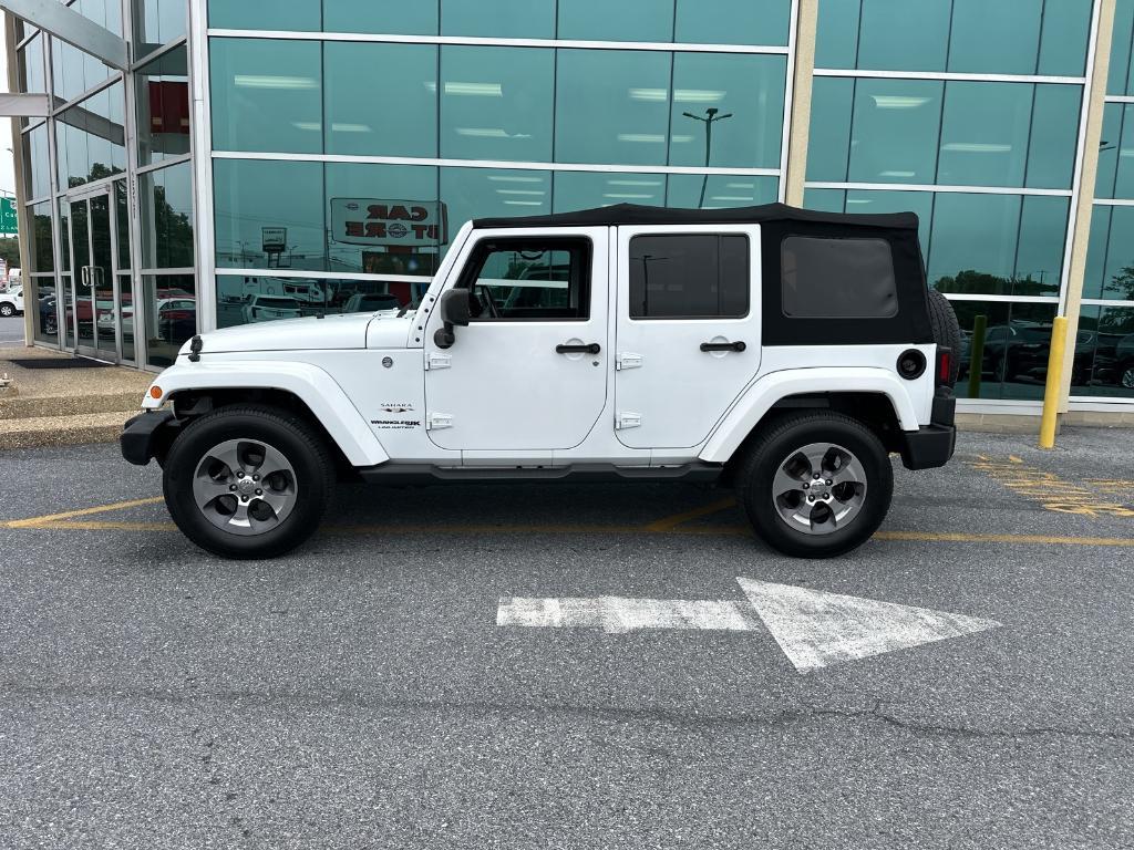 used 2018 Jeep Wrangler JK Unlimited car, priced at $23,779