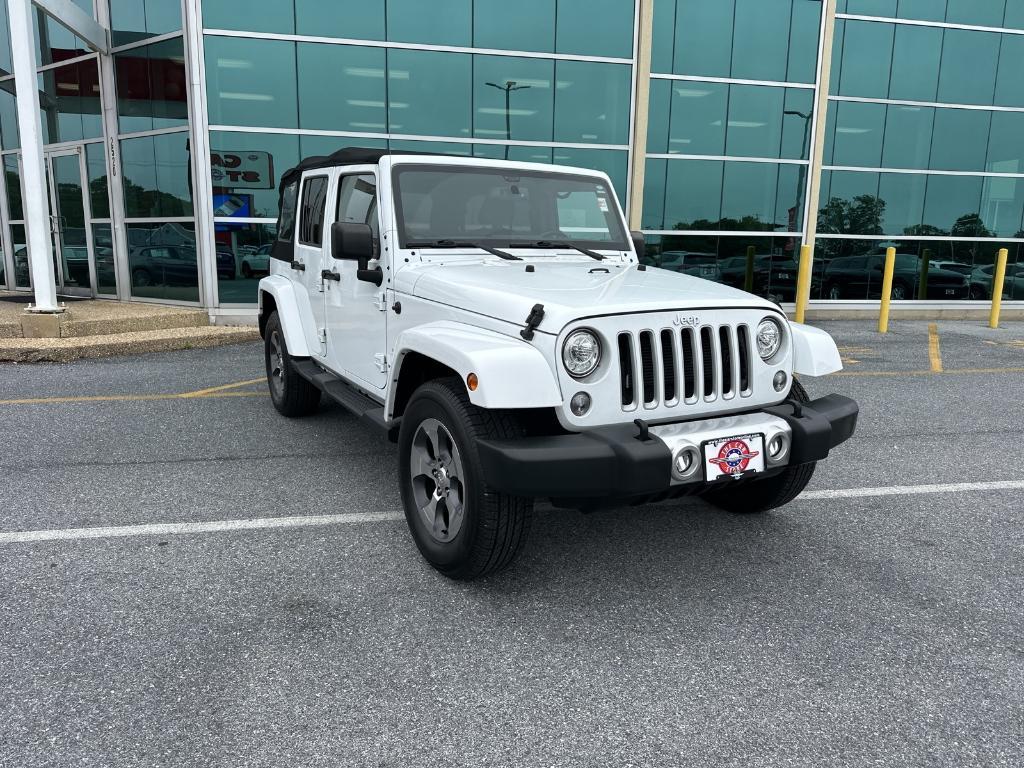 used 2018 Jeep Wrangler JK Unlimited car, priced at $23,779
