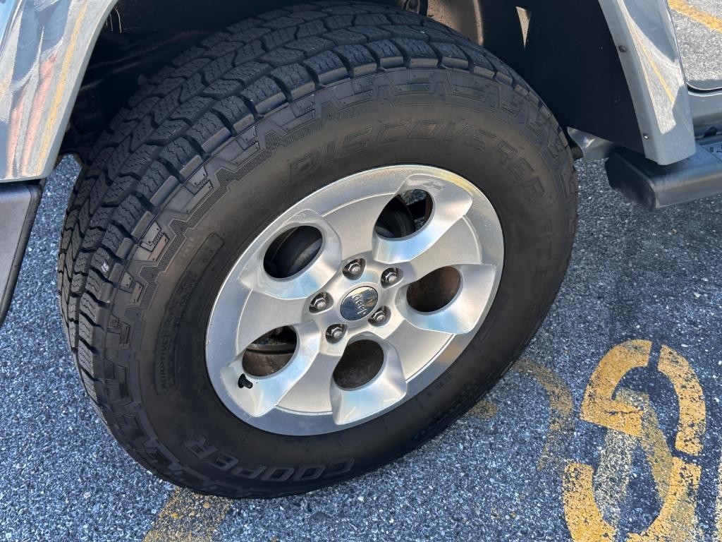 used 2014 Jeep Wrangler Unlimited car, priced at $18,879