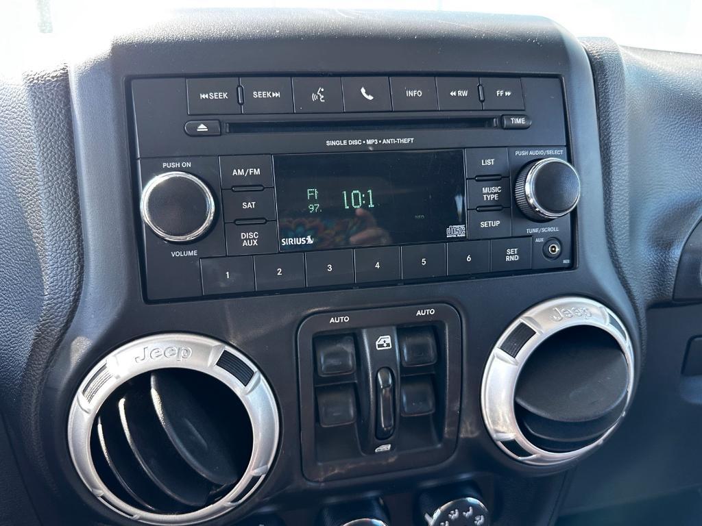 used 2014 Jeep Wrangler Unlimited car, priced at $18,879
