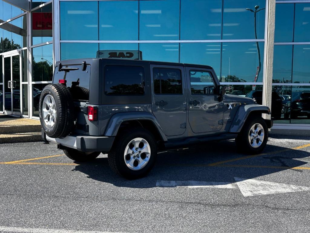 used 2014 Jeep Wrangler Unlimited car, priced at $18,879