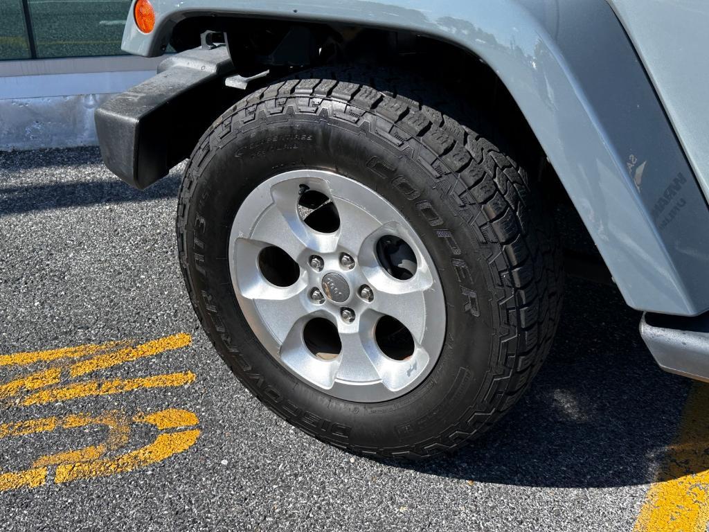used 2014 Jeep Wrangler Unlimited car, priced at $18,879