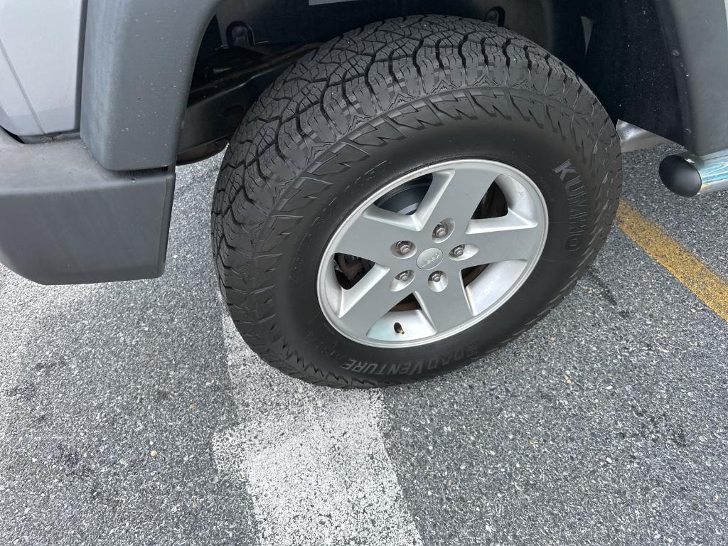 used 2013 Jeep Wrangler Unlimited car, priced at $17,879