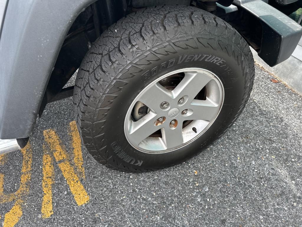 used 2013 Jeep Wrangler Unlimited car, priced at $16,979