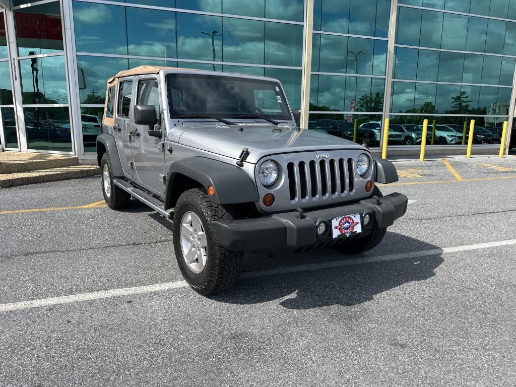 used 2013 Jeep Wrangler Unlimited car, priced at $16,979