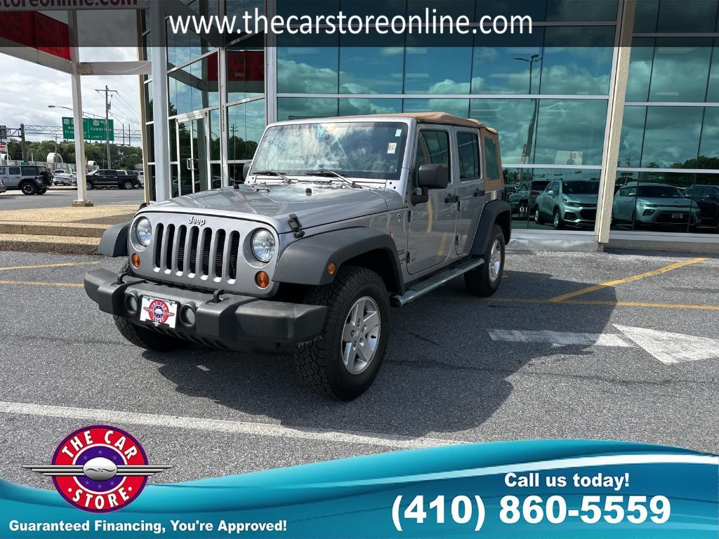used 2013 Jeep Wrangler Unlimited car, priced at $16,979