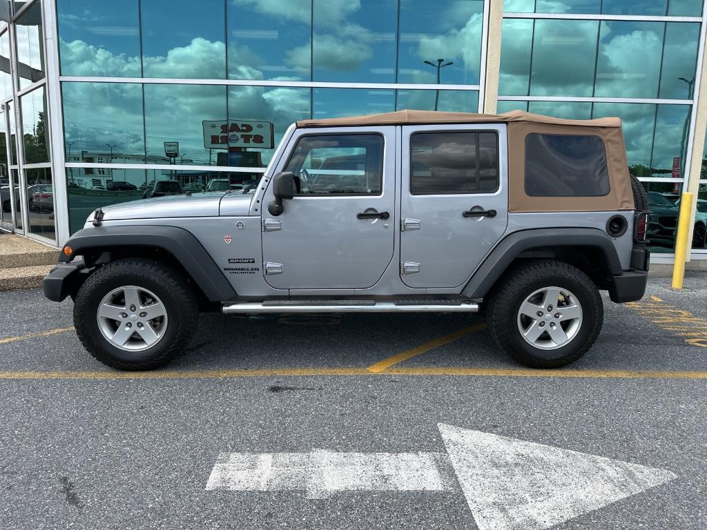 used 2013 Jeep Wrangler Unlimited car, priced at $16,979