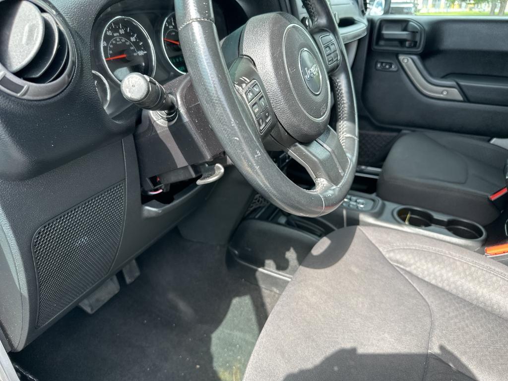 used 2013 Jeep Wrangler Unlimited car, priced at $16,979