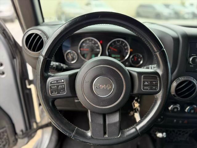 used 2015 Jeep Wrangler Unlimited car, priced at $16,995