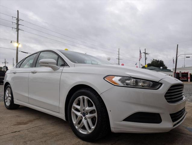 used 2016 Ford Fusion car, priced at $12,750