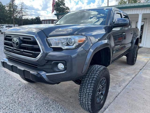 used 2018 Toyota Tacoma car, priced at $27,495