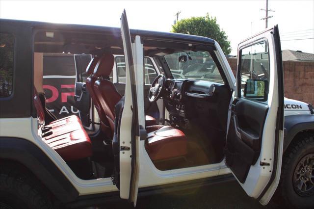 used 2013 Jeep Wrangler Unlimited car, priced at $56,999