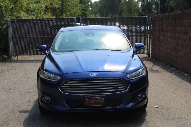 used 2014 Ford Fusion car, priced at $12,499