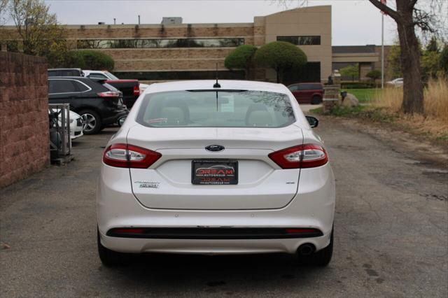 used 2014 Ford Fusion Energi car, priced at $9,999