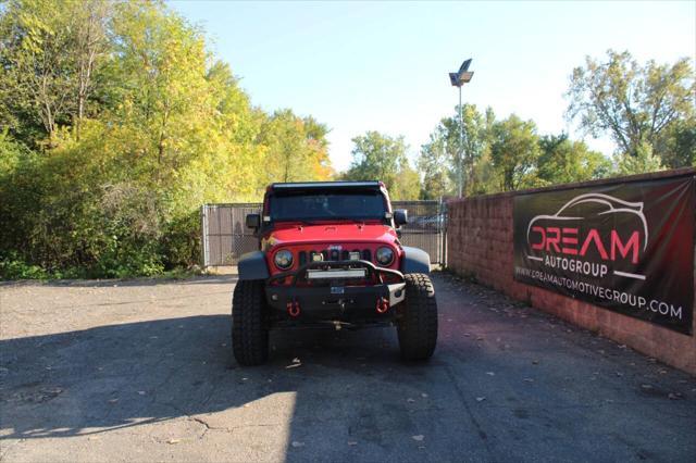 used 2012 Jeep Wrangler Unlimited car, priced at $21,499