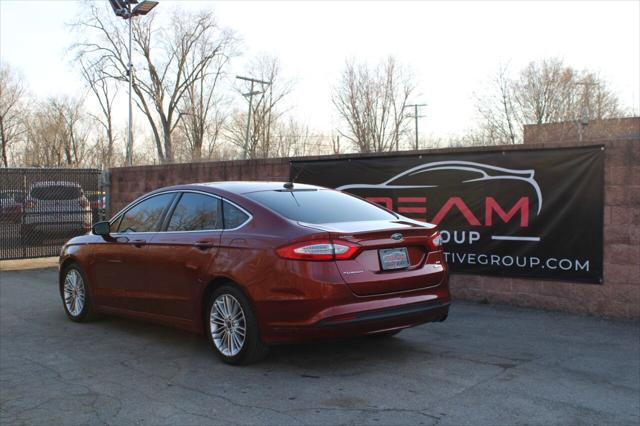 used 2014 Ford Fusion car, priced at $10,899