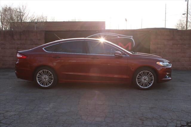 used 2014 Ford Fusion car, priced at $10,899