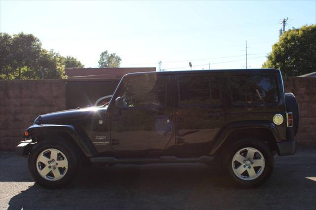 used 2011 Jeep Wrangler Unlimited car, priced at $14,999