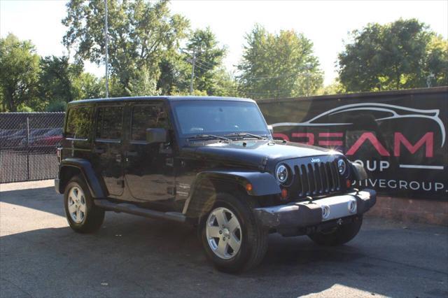 used 2011 Jeep Wrangler Unlimited car, priced at $14,999