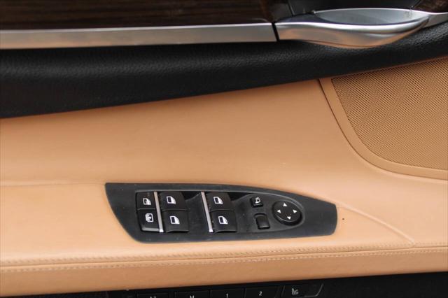 used 2011 BMW 750 car, priced at $14,829