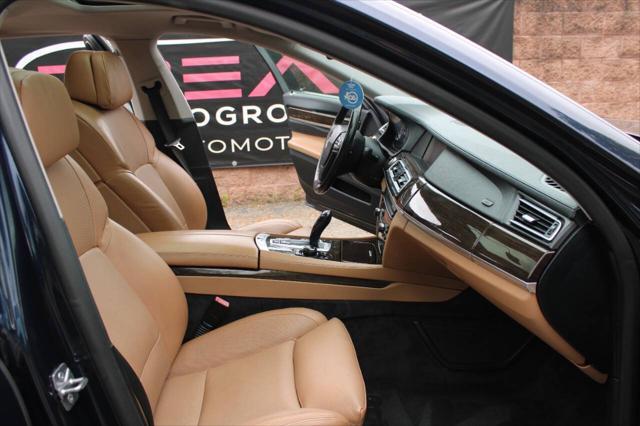 used 2011 BMW 750 car, priced at $14,829