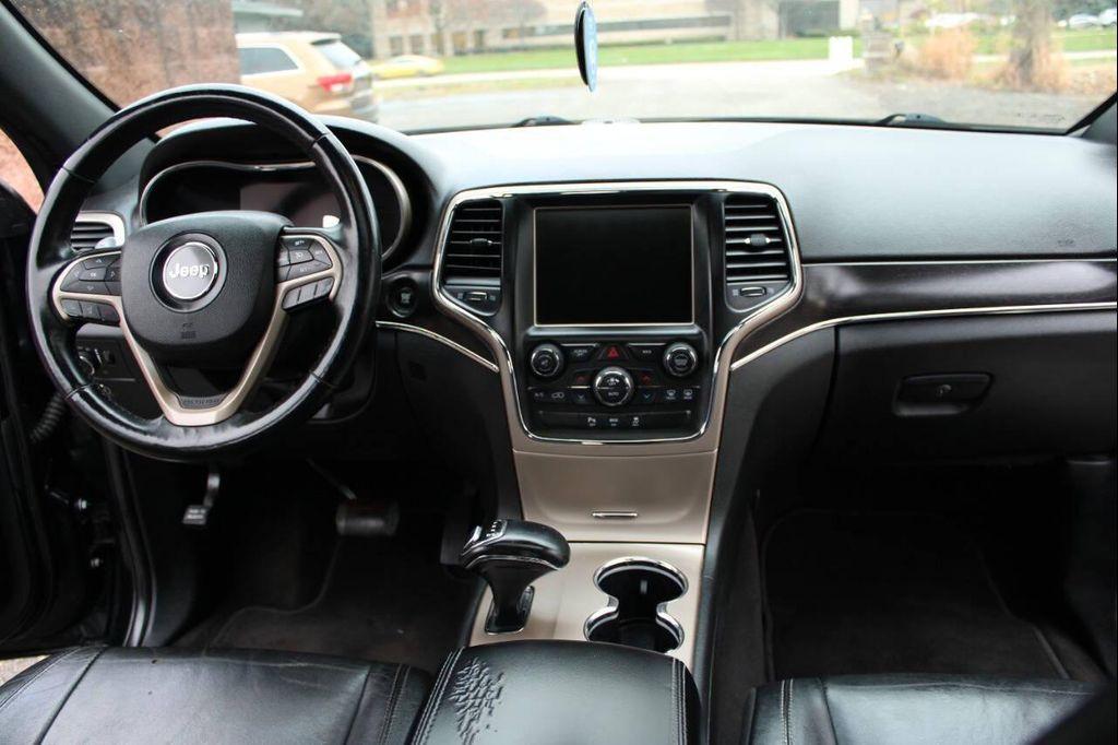 used 2014 Jeep Grand Cherokee car, priced at $14,269