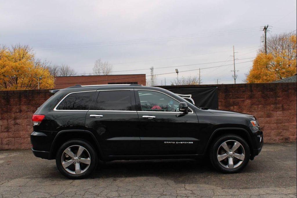 used 2014 Jeep Grand Cherokee car, priced at $14,269