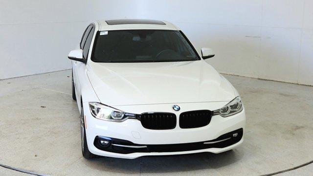 used 2018 BMW 330 car, priced at $17,662