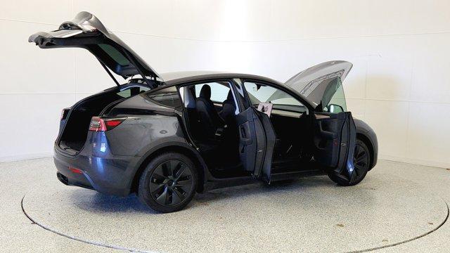 used 2025 Tesla Model Y car, priced at $36,291