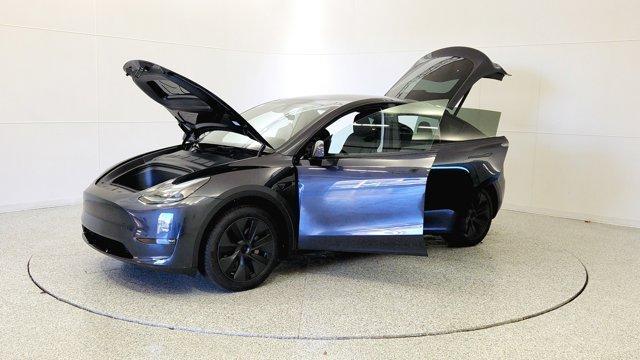 used 2025 Tesla Model Y car, priced at $36,291