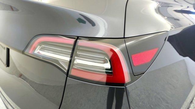 used 2025 Tesla Model Y car, priced at $36,291