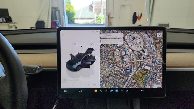used 2025 Tesla Model Y car, priced at $36,291