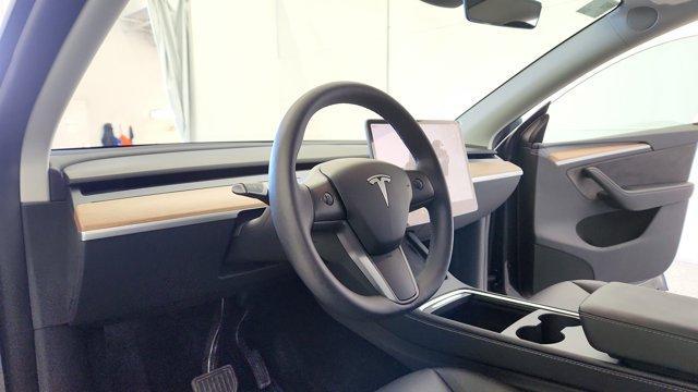 used 2025 Tesla Model Y car, priced at $36,291