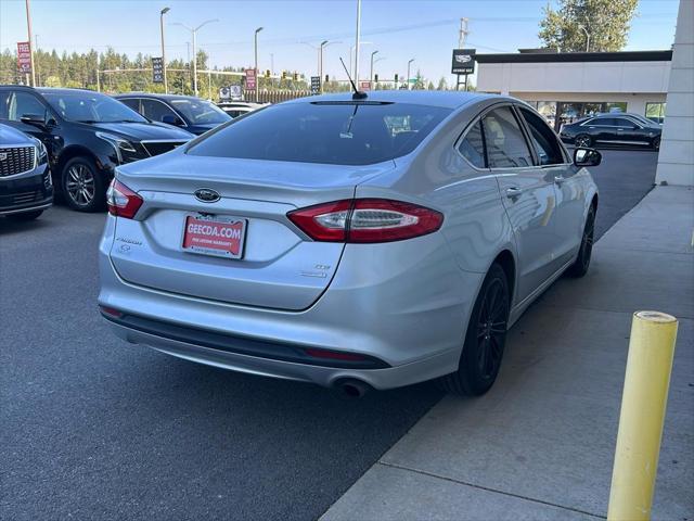 used 2014 Ford Fusion car, priced at $10,999