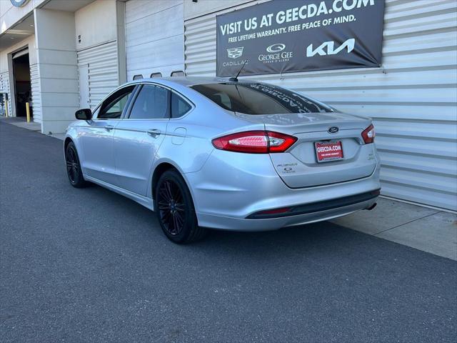 used 2014 Ford Fusion car, priced at $10,999