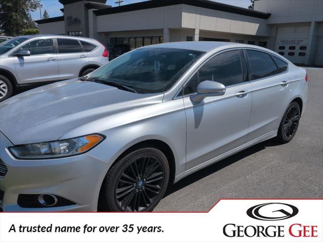 used 2014 Ford Fusion car, priced at $9,991