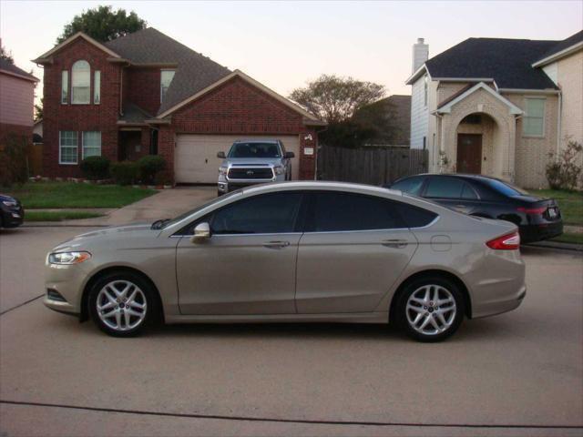 used 2015 Ford Fusion car, priced at $6,995