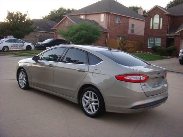 used 2015 Ford Fusion car, priced at $6,995