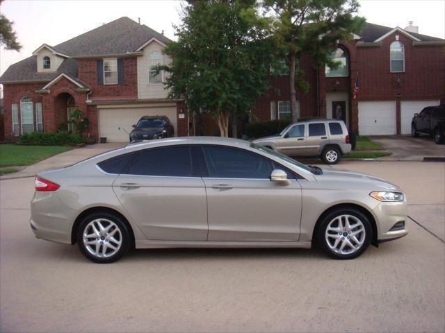 used 2015 Ford Fusion car, priced at $6,995