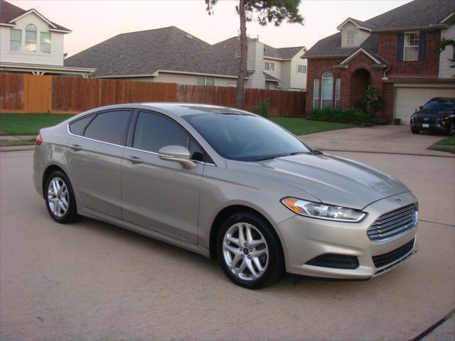 used 2015 Ford Fusion car, priced at $6,995