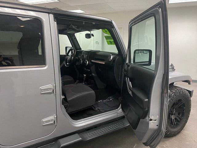 used 2014 Jeep Wrangler Unlimited car, priced at $17,891