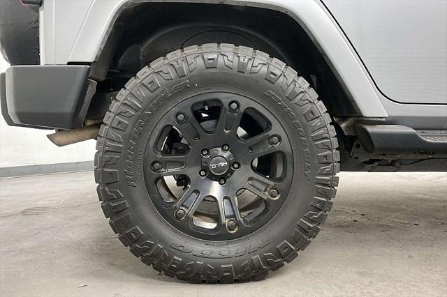 used 2014 Jeep Wrangler Unlimited car, priced at $17,491