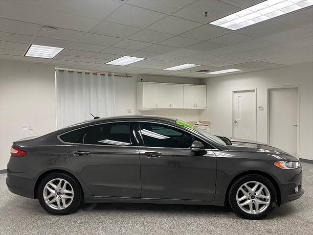 used 2016 Ford Fusion car, priced at $6,891