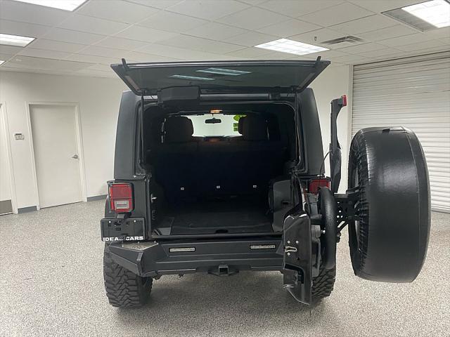 used 2011 Jeep Wrangler Unlimited car, priced at $16,991