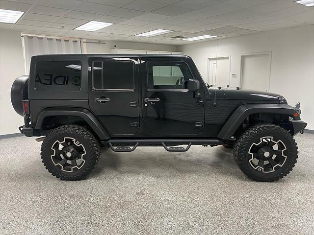 used 2011 Jeep Wrangler Unlimited car, priced at $16,991