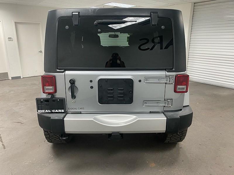 used 2014 Jeep Wrangler Unlimited car, priced at $19,791