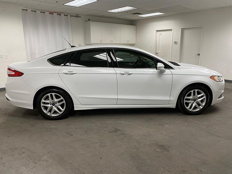 used 2016 Ford Fusion car, priced at $10,491