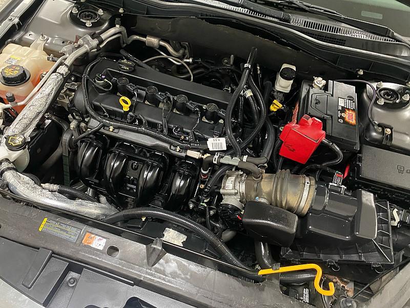 used 2012 Ford Fusion car, priced at $6,991